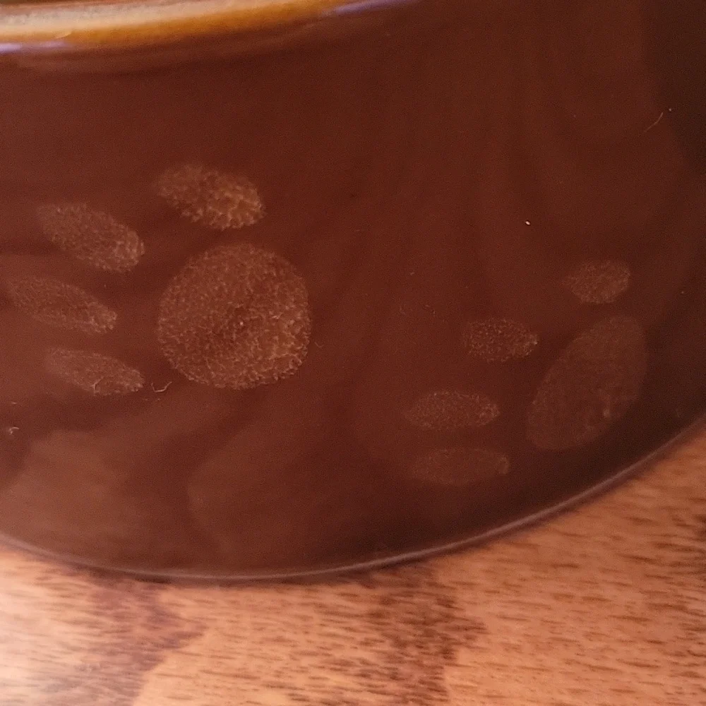 Two dark brown ceramic stoneware dog bowls.  5
